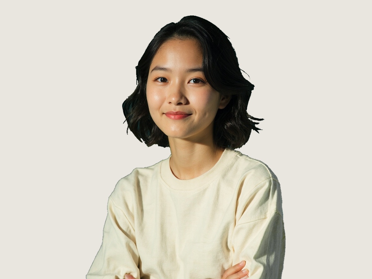 AI-generated fictional creator with an amused expression